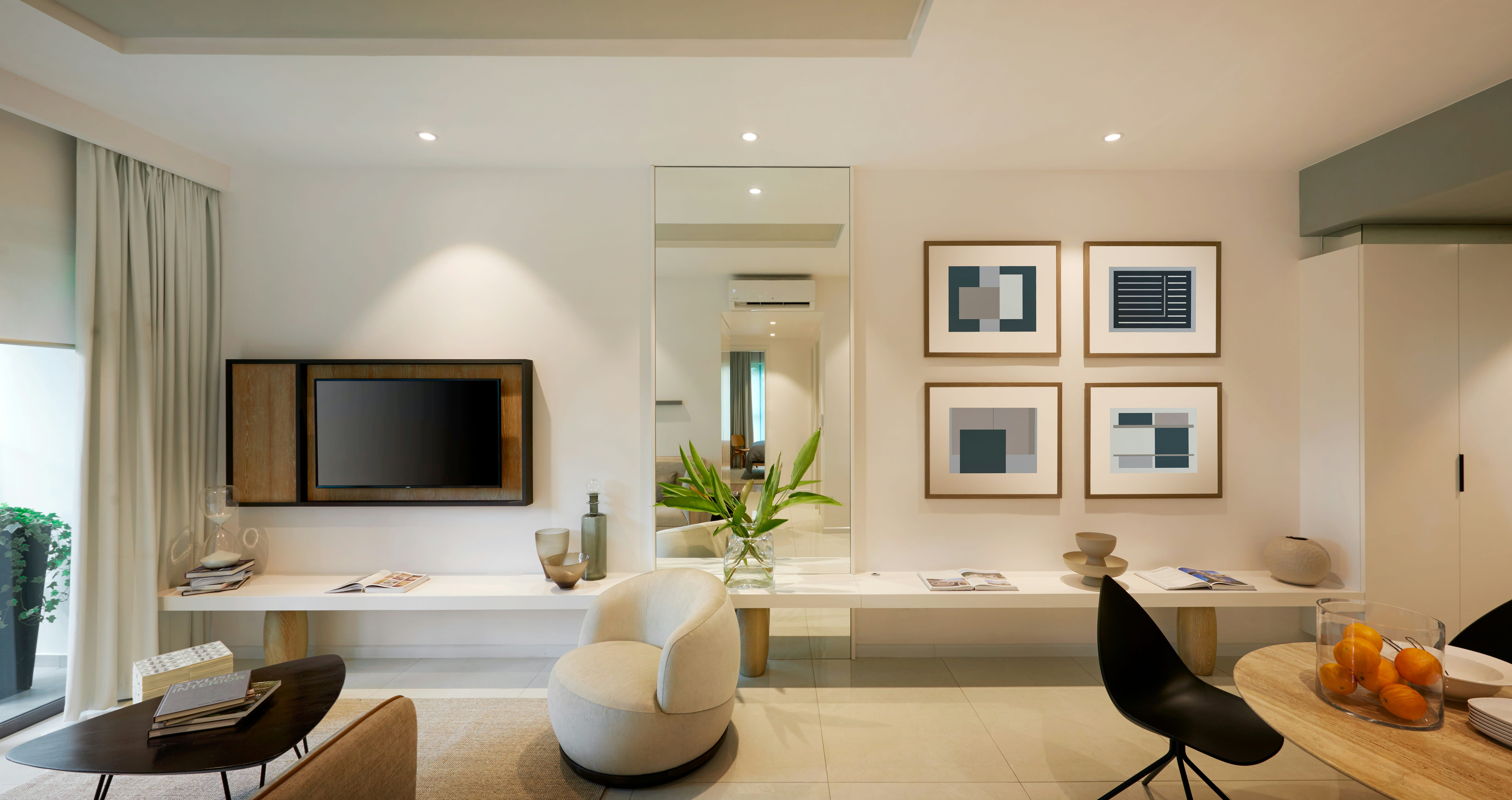A serene, sunlit modern South African living room featuring neutral tones, indoor plants, and natural wood elements designed for wellness and mental wellbeing.